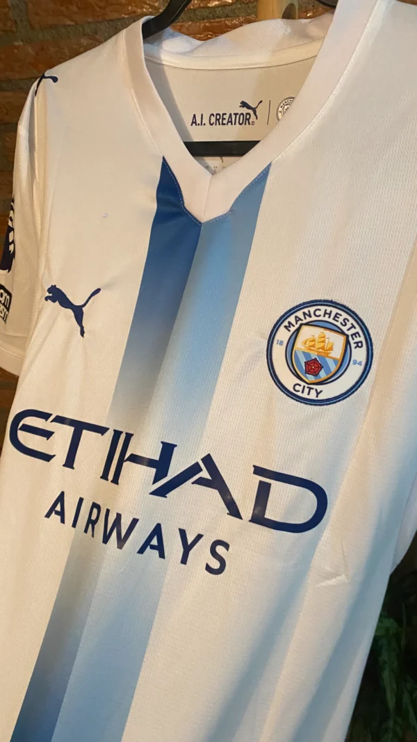 26/27 Manchester City visita